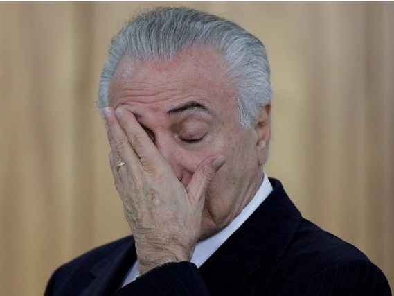 Brazilian President Michel Temer reacts during a credentials presentation ceremony for several new top diplomats at Planalto Palace in Brasilia, Brazil June 26, 2017. REUTERS/Ueslei Marcelino