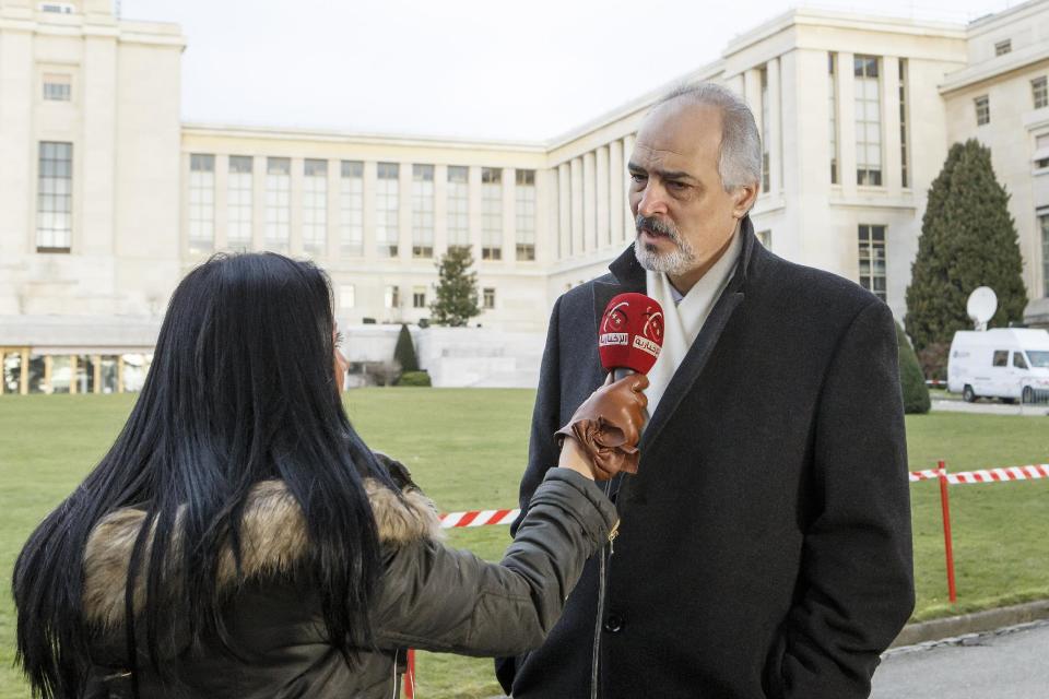 Bashar Ja' afari, Ambassador of the Permanent Representative Mission of Syria to UN New York, speaks to the press before a meeting, at the European headquarters of the United Nations, in Geneva, Switzerland, Saturday, Jan 25, 2014. Two Syrian delegations, representatives of Syrian President Bashar Assad and Syrian opposition, are meeting together with the Joint Special Representative. (AP Photo/Keystone,Salvatore Di Nolfi)