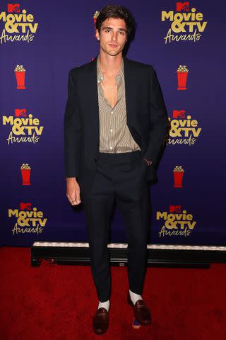 Kevin Winter/2021 MTV Movie and TV Awards/Getty Jacob Elordi poses backstage during the 2021 MTV Movie & TV Awards in L.A. on May 16, 2021.