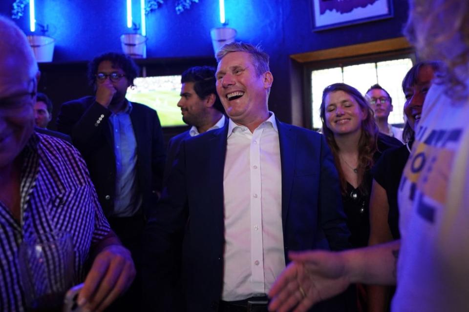 Labour Party leader Sir Keir Starmer speaks to members of the public as he watches the Arsenal v Tottenham Hotspur match at The Font pub in Brighton (PA) (PA Wire)