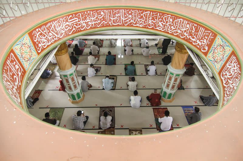 Indonesia Muslims take part in Friday prayers at a mosque, amid the spread of coronavirus disease (COVID-19) outbreak, in Depok