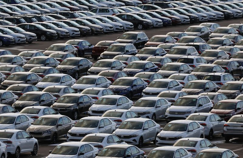 FILE PHOTO: New cars are seen parked at the plant of Volkswagen Group Rus in Kaluga