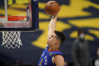 Denver Nuggets forward Michael Porter Jr. dunks against the Brooklyn Nets during the first half of an NBA basketball game Saturday, May 8, 2021, in Denver. (AP Photo/David Zalubowski)