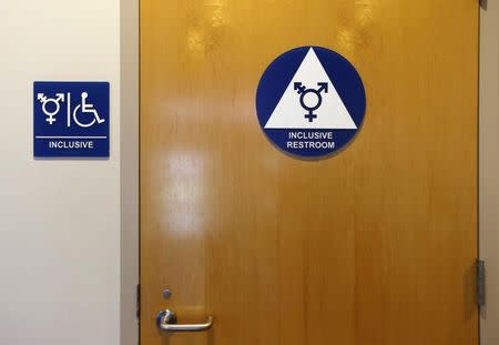 FILE PHOTO: A gender-neutral bathroom is seen at the University of California, Irvine in Irvine, California September 30, 2014. REUTERS/Lucy Nicholson