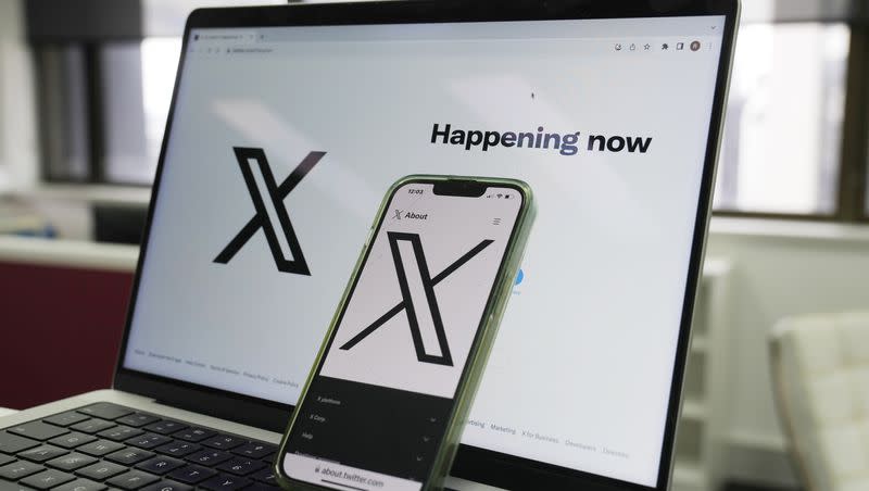 The opening page of X is displayed on a computer and phone on Oct. 16, 2023. A nonprofit founded by talk show host Dennis Prager plans to highlight a video about gender detransitioning on X, the platform formerly known as Twitter.