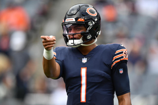 Justin Fields beats Andy Dalton to end zone in Bears opener