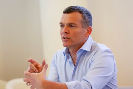 Nadav Zafrir, CEO of Israeli cyber group Team8 gestures during an interview with Reuters at a cyber conference at Tel Aviv University