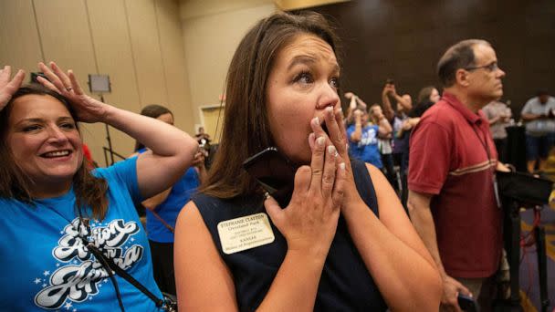 State Rep. Stephanie Clayton reacts to news that a constitutional amendment that would have declared there is no right to abortion was voted down, during the Kansans for Constitutional Freedom election watch party,in Overland Park, Kan, Aug. 8, 2022. (Evert Nelson/USA Today Network via Reuters)