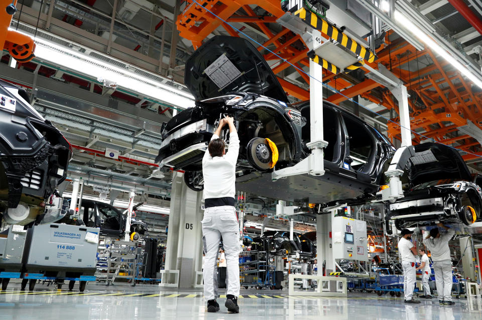 Workers at Audi e-tron production line at its Brussels assembly plant, Belgium. Photo: Francois Lenoir/Reuters