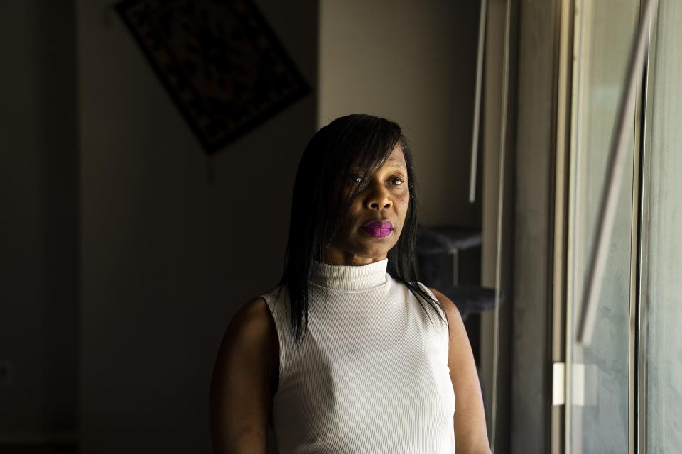 JoAnn Ellis (in white) poses for a portrait at her daughter Arielle's home on April 29, 2022 in Avondale.