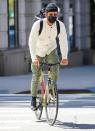 <p>Justin Theroux hops on his bike for a ride around New York City on Monday.</p>