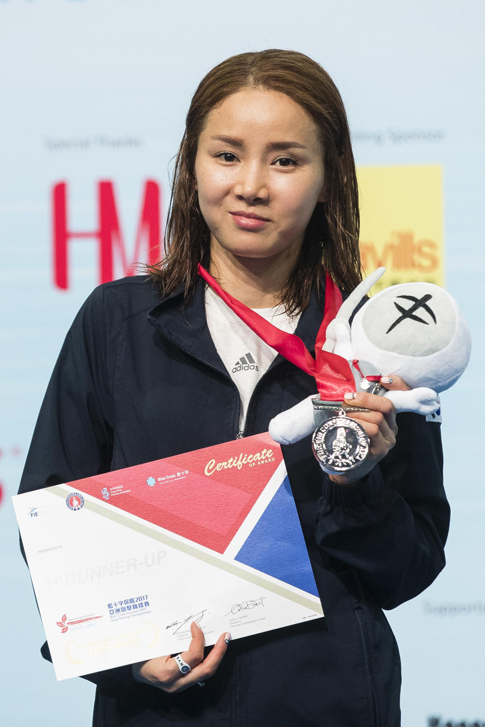 HONG KONG, HONG KONG - JUNE 16: Nam Hyunhee of South Korea poses for photos with her medal during the Asian Fencing Championships 2017 on June 15, 2017 in Hong Kong, Hong Kong. (Photo by Power Sport Images/Getty Images)