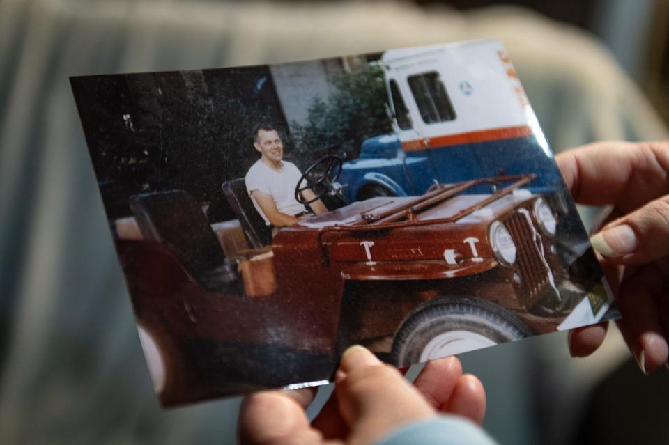 A photo of Duane Nicol, of Charlotte, in a replica of a Jeep he used during his service in the Navy, seen Tuesday, Dec. 5, 2023, at his daughter Jana's home in Lansing. Duane was a World War II Navy veteran from Charlotte who served in both the Pacific and Atlantic theaters. Jana, now 60, has spent the past two years transcribing her father's journal, photo albums, and more than 300 letters sent home during his tours of duty abroad.