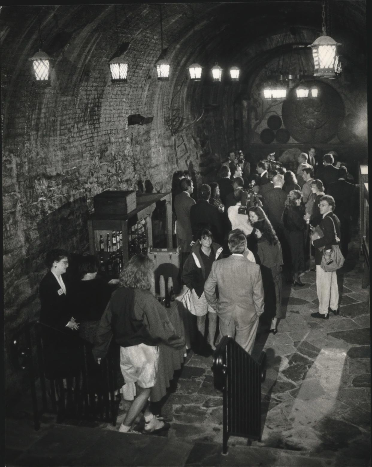 Visitors to Miller Brewing Co. celebrate the reopening of the Caves Museum in June 1993. The caves, which had been turned into a museum in 1953, had been closed for three years for a renovation project.