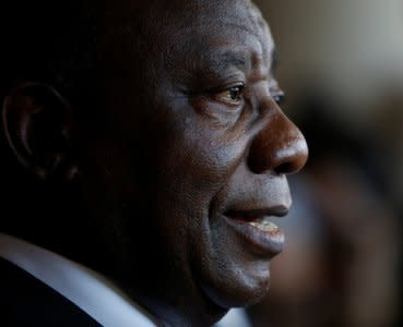 FILE PHOTO: South African Deputy President Cyril Ramaphosa speaks with journalists at the World Economic Forum on Africa 2017 meeting in Durban, South Africa, May 5, 2017. REUTERS/Rogan Ward/File Photo