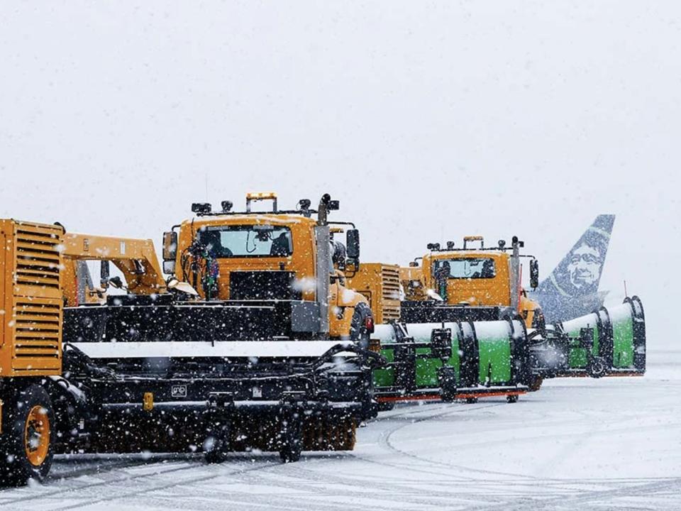 Alaska Airlines deicing in snow at Seattle-Tacoma International Airport on December 20, 2022.