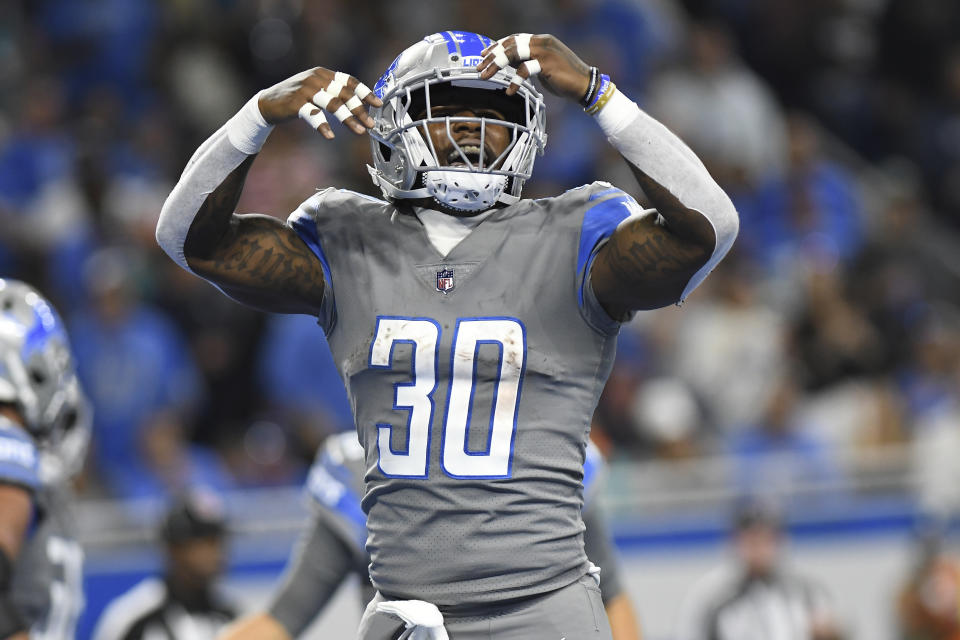 Detroit Lions running back Jamaal Williams reacts after a play during the first half of an NFL football game against the Miami Dolphins, Sunday, Oct. 30, 2022, in Detroit. (AP Photo/Lon Horwedel)