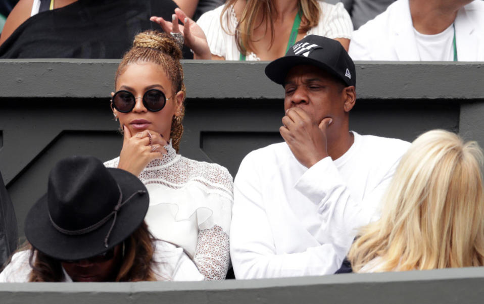 <p>Dressed in Self Portrait, Beyonce cut one stylish figure on Centre Court accompanied by her husband Jay Z. <i>[Photo: PA Images]</i></p>