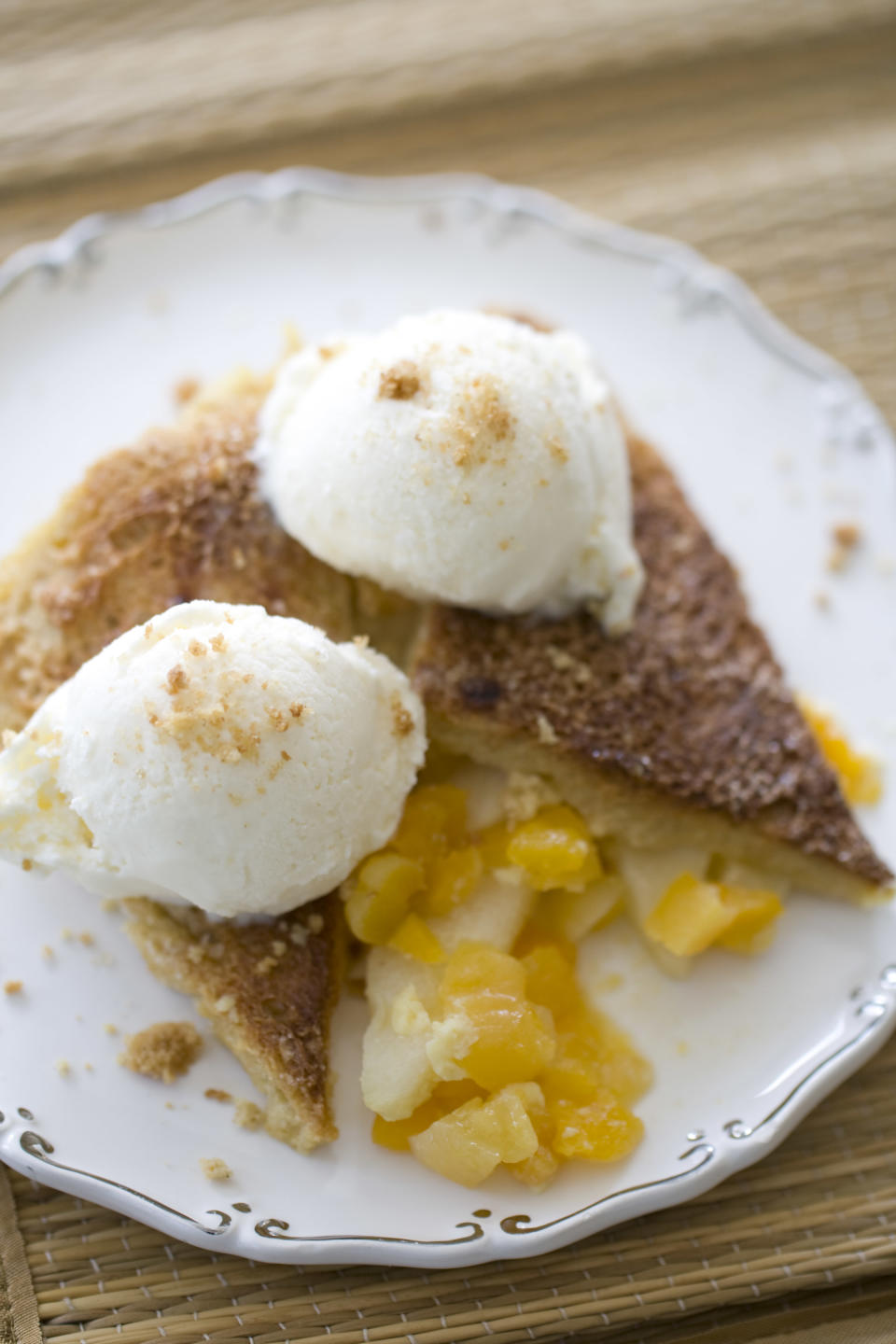 This Sept. 8, 2013 photo shows baked apples and apricots with French toast crust in Concord, N.H. (AP Photo/Matthew Mead)