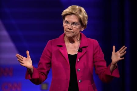 FILE PHOTO: Democratic 2020 U.S. presidential candidate Senator Elizabeth Warren (D-MA) gestures in a televised townhall on CNN dedicated to LGBTQ issues in Los Angeles, California