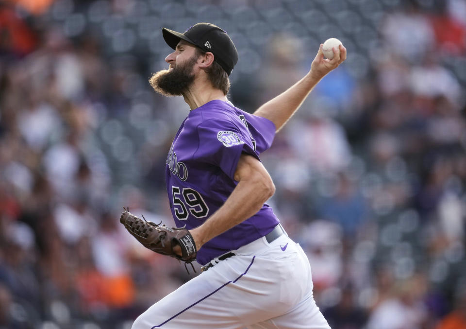 Colorado Rockies starting pitcher Jake Bird works against the Houston Astros during the first inning of a baseball game Tuesday, July 18, 2023, in Denver. (AP Photo/David Zalubowski)