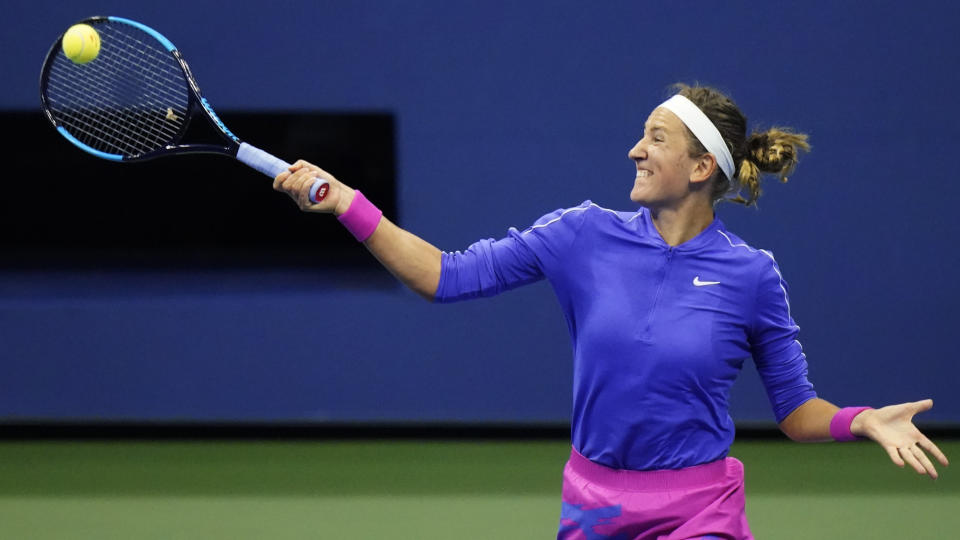 Victoria Azarenka, of Belarus, returns to Elise Mertens, of Belgium, during the quarterfinal round of the US Open tennis championships, Wednesday, Sept. 9, 2020, in New York. (AP Photo/Frank Franklin II)