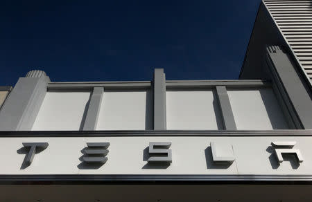 FILE PHOTO: A Tesla showroom is seen in Santa Monica, California, U.S., January 4, 2018. REUTERS/Lucy Nicholson/File Photo