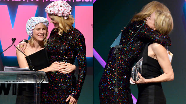 Nicole Kidman and Naomi Watts packed on the PDA when they hit the stage at Tuesday's Women in Film's 2015 Crystal + Lucy Awards. Upon presenting Kidman with the Crystal Award for Excellence in Film, Watts went in for a big kiss with her gal pal. The Aussie actresses were clearly in a silly mood because they were also donning colorful shower caps with their high-fashion outfits. <strong> WATCH: Nicole Kidman and Keith Urban Get Romantic on the Oscars Red Carpet </strong> Getty Images Kidman's style was just as award winning! The 47-year-old actress showed up to the event with her husband Keith Urban wearing a sparkling Nina Ricci dress, Brian Atwood shoes and a Max Mara clutch. <strong> PHOTOS: Sweetest Celebrity PDA Moments </strong> Getty Images Celebrities kissing in public seems to be a trend this month. Just last week, best buds Sir Patrick Stewart and Sir Ian McKellen locked lips at the London <em>Mr. Holmes</em> premiere -- and needless to say, it was adorable!