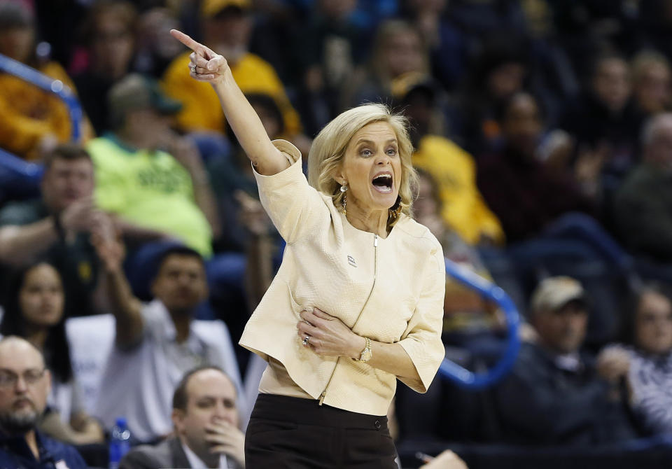 Baylor head coach Kim Mulkey coaches her team against Kansas State during the first half of an NCAA college basketball game in the Big 12 women's conference tournament in Oklahoma City, Sunday, March 10, 2019. (AP Photo/Alonzo Adams)