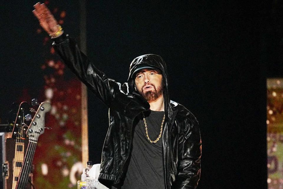 <p>Jeff Kravitz/FilmMagic)</p> Eminem performs on stage during the 37th Annual Rock & Roll Hall of Fame Induction Ceremony at Microsoft Theater in November 2022 in Los Angeles