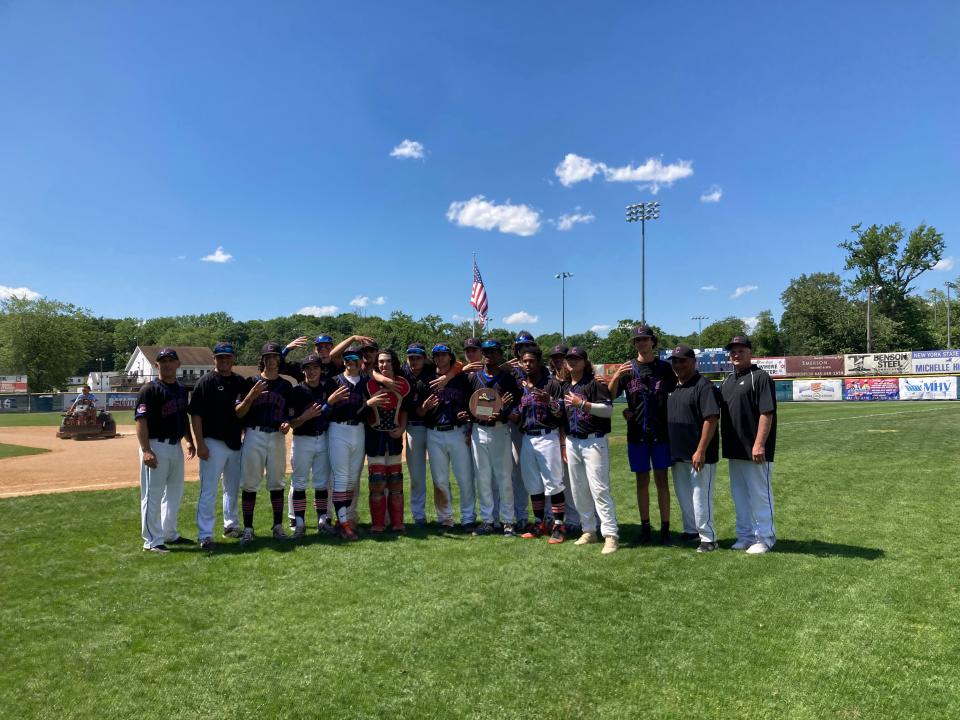 The Chester baseball team poses with the NYSPHSAA Class C regional final plaque and advances to the state semifinals for the first time in program history after a 3-0 win over Section 11's Port Jefferson on June 4, 2022, at Cantine Field in Saugerties.