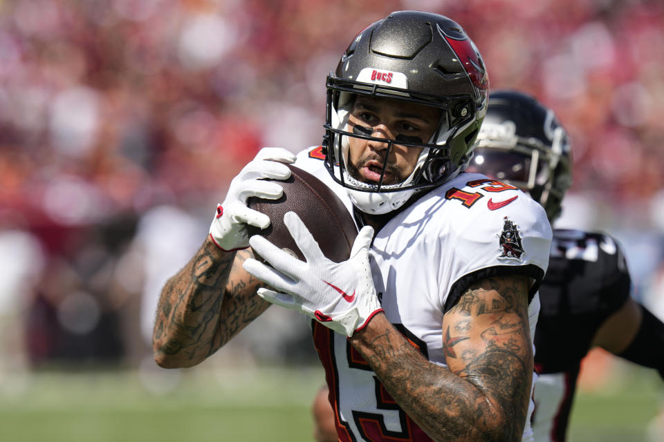 Tampa Bay Buccaneers wide receiver Mike Evans (13) makes a catch for a touchdown against the Atlanta Falcons during the first half of an NFL football game, Sunday, Oct. 22, 2023, in Tampa, Fla. (AP Photo/Chris O'Meara)