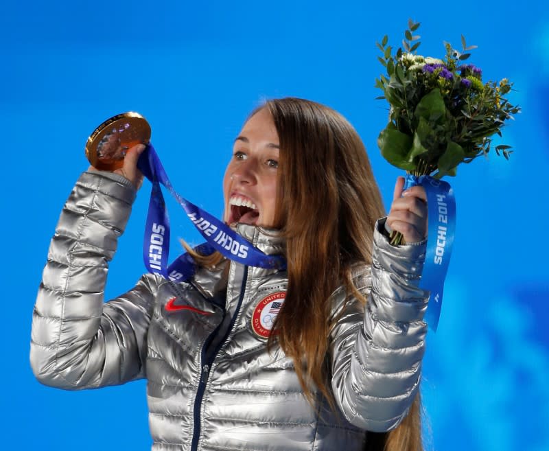 FILE PHOTO: Bowman celebrates during the victory ceremony for the women's freestyle skiing halfpipe event at the 2014 Sochi Winter Olympics