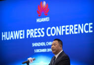 Song Liuping, chief legal officer of Huawei, speaks during a press conference at Huawei's campus in Shenzhen in southern China's Guandong Province, Thursday, Dec. 5, 2019. Chinese tech giant Huawei is asking a U.S. federal court to throw out a rule that bars rural phone carriers from using government money to purchase its equipment on security grounds. (AP Photo/Mark Schiefelbein)