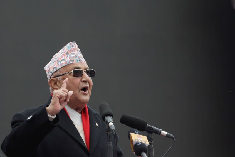 Pro-government activists take part in a mass gathering in support of Nepal's Prime Minister, after the dissolution of parliament in Kathmandu