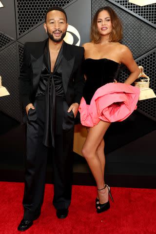 <p>Matt Winkelmeyer/Getty</p> John Legend and Chrissy Teigen, February 2024