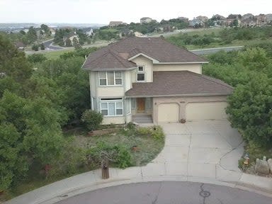 The five-bedroom house in Broadmoor Bluffs Estates is listed for $590,000 (KMGH)