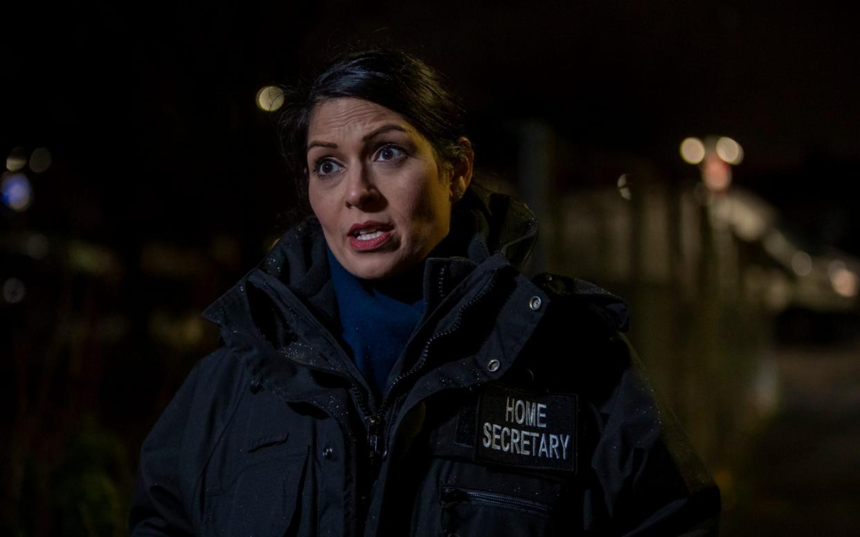 Home Secretary Priti Patel accompanied Immigration Enforcement Officers on an early morning arrest in north London of a suspected suspected of having a significant financial role in an organised crime group linked to people smuggling activity - Heathcliff O'Malley