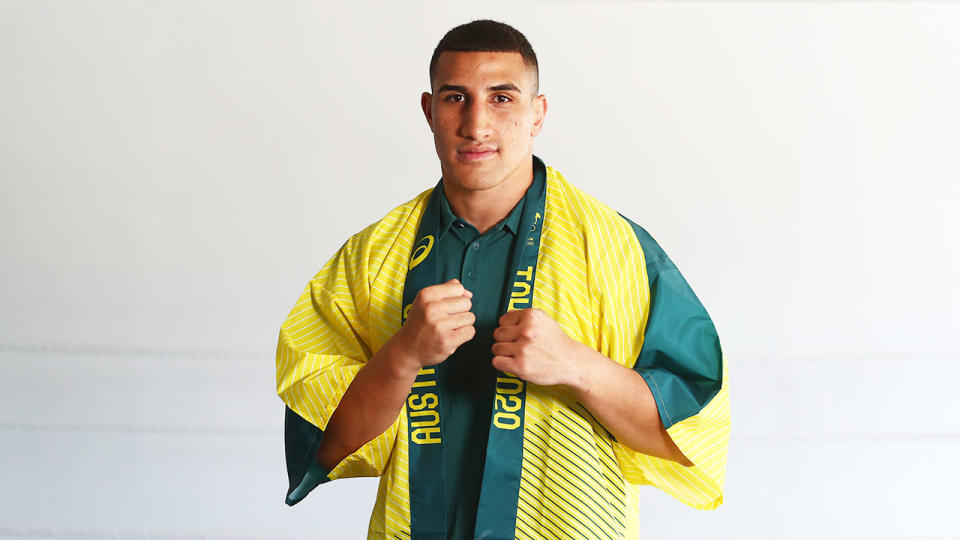 Justis Huni is pictured here wearing the Australian Olympic Games colours.