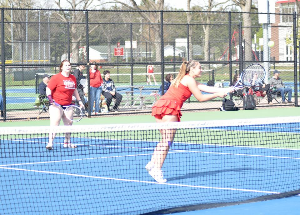 The no. 1 doubles team of Carly Krzyzanski (front) and Luci Cunningham (back) defeated their Marshall counterparts in straight sets Monday