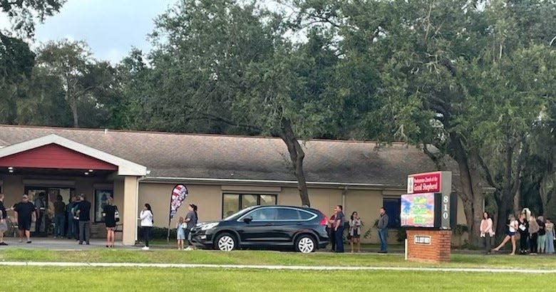 Election Day lineup: Between 4 p.m. and 5 p.m., a line of voters rings the building at the Presbyterian Church of the Good Shepherd on West Florida Avenue in West Melbourne.