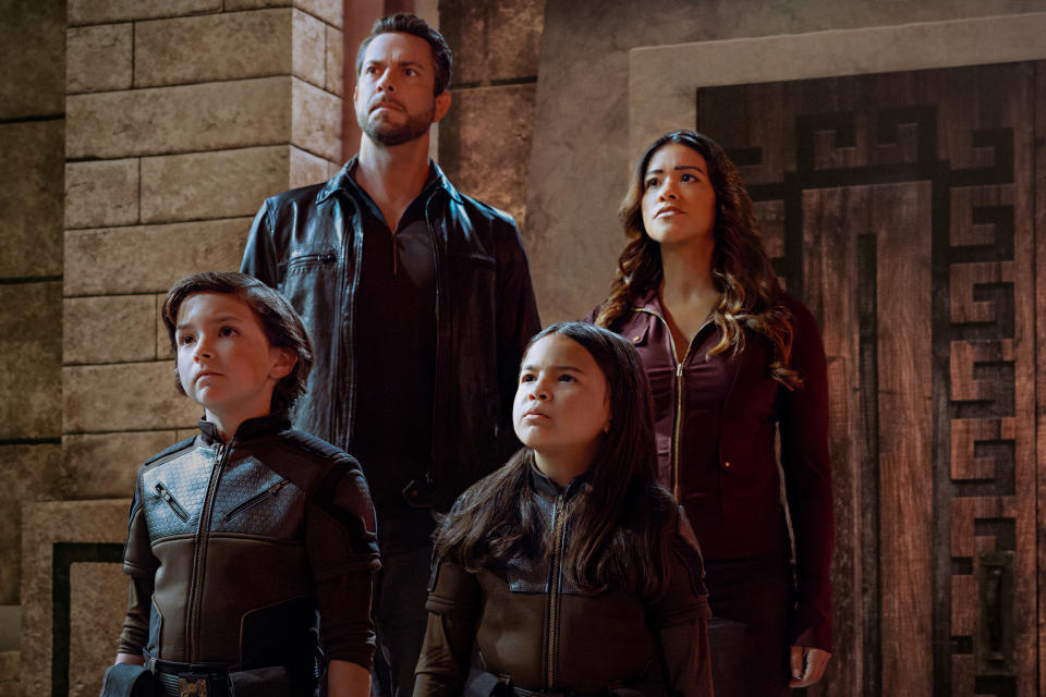 (L-R) Connor Esterson as Tony Torrez, Zachary Levi as Terrence Torrez, Everly Carganilla as Patty Torrez and Gina Rodriguez as Nora Torrez in Spy Kids: Armageddon. (Lauren Hatfield/Netflix)