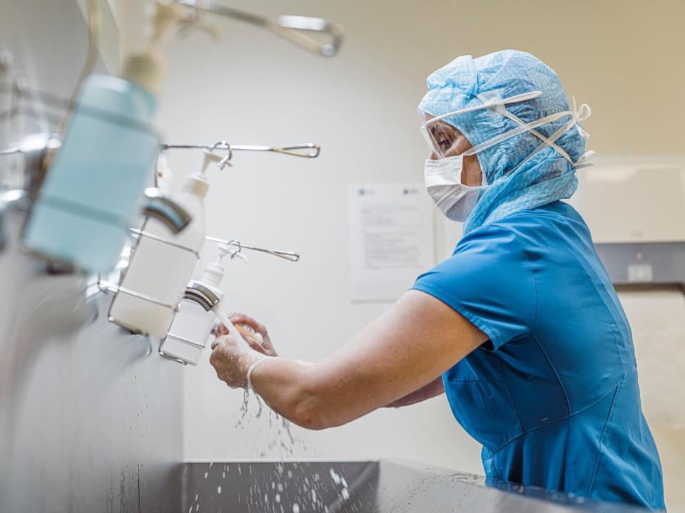 Nurse washing hands to avoid Covid 19 virus. - stock photo Nurse doing hand hygiene to prevent Coronavirus infection.