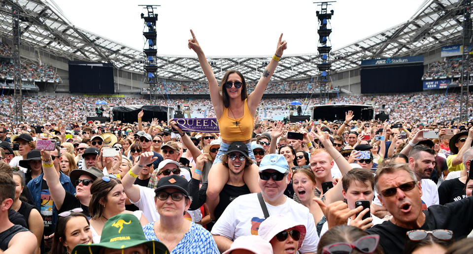 Fans in the crowd during the Fire Fight Australia bushfire relief concert at ANZ Stadium in Sydney. Source: AAP