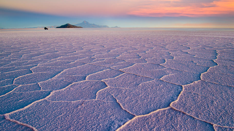 Salar de Uyuni hexagons at sunset in Bolivia.