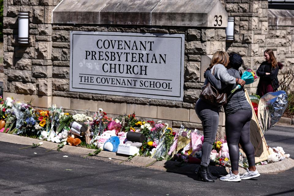 Tributes at the entrance to the Covenant School on March 29, 2023, in Nashville, Tenn., after a former student at the school killed three students and three teachers.