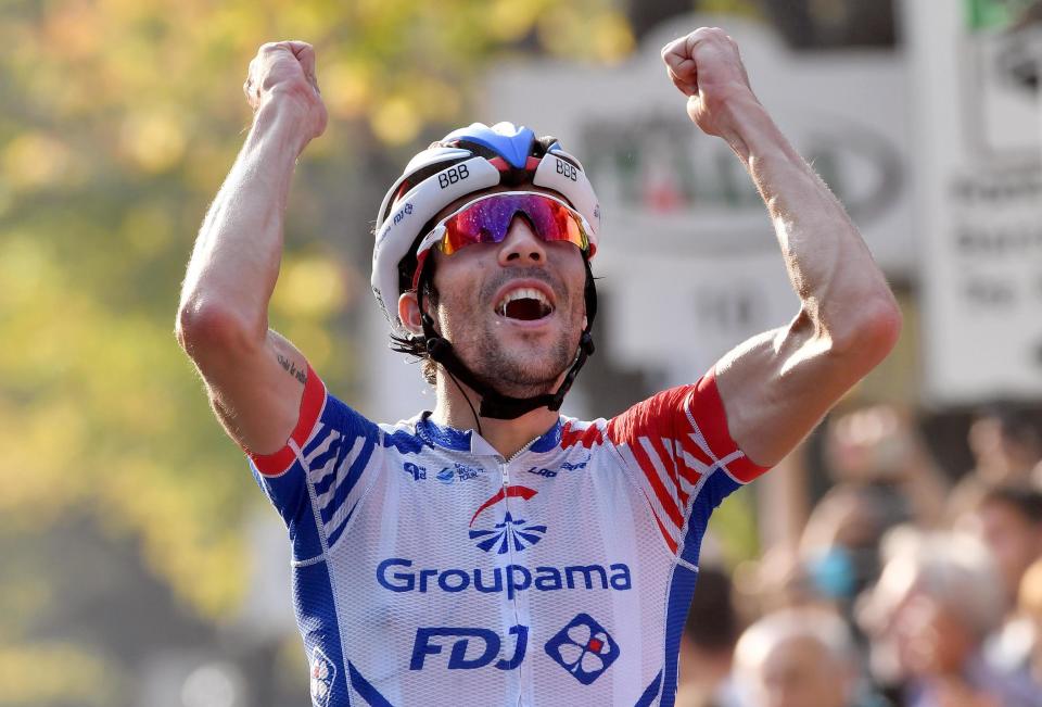 First placed, France's Thibaut Pinot celebrates after crossing the finish line of the Giro di Lombardia cycling race in Como, Italy, Saturday, Oct. 13, 2018. (Daniel dal Zennaro/ANSA via AP)