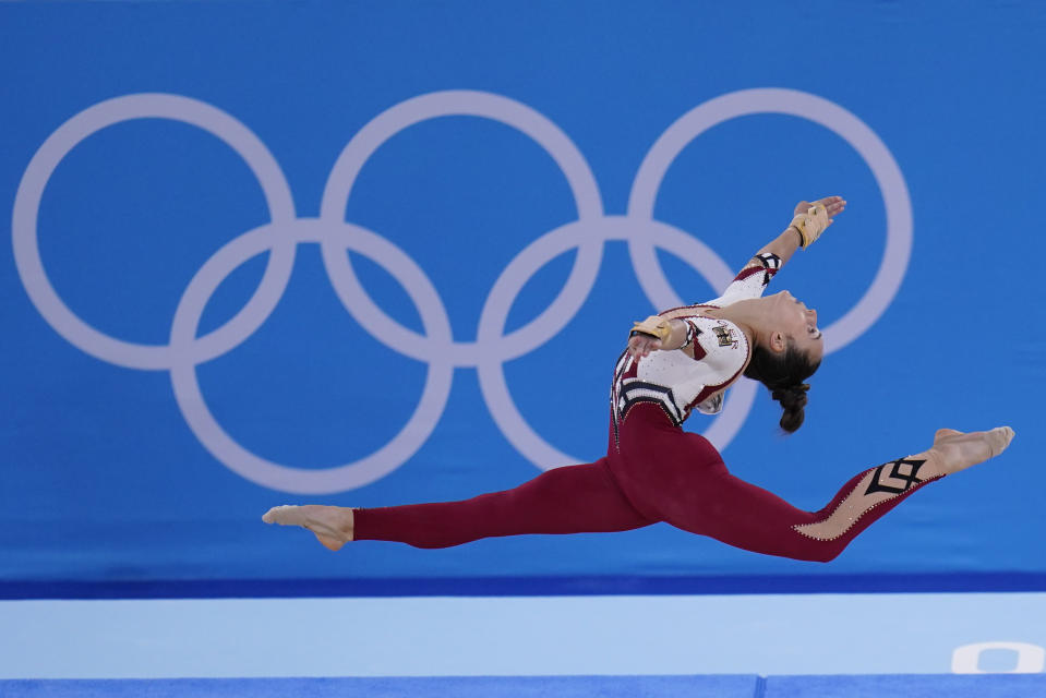 Pauline Schaefer-Betz, of Germany, performs her floor exercise routine during the women's artistic gymnastic qualifications at the 2020 Summer Olympics, Sunday, July 25, 2021, in Tokyo. (AP Photo/Gregory Bull)