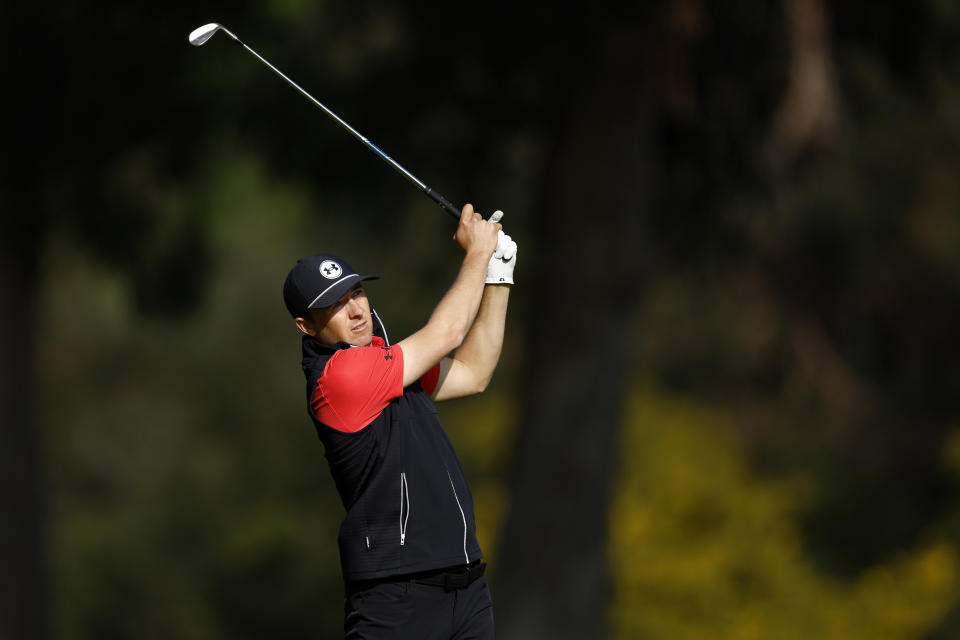 Jordan Spieth makes his second shot on the 13th hole during the second round of the Genesis Invitational golf tournament at Riviera Country Club Friday, Feb. 16, 2024, in the Pacific Palisades area of Los Angeles. (AP Photo/Ryan Kang)