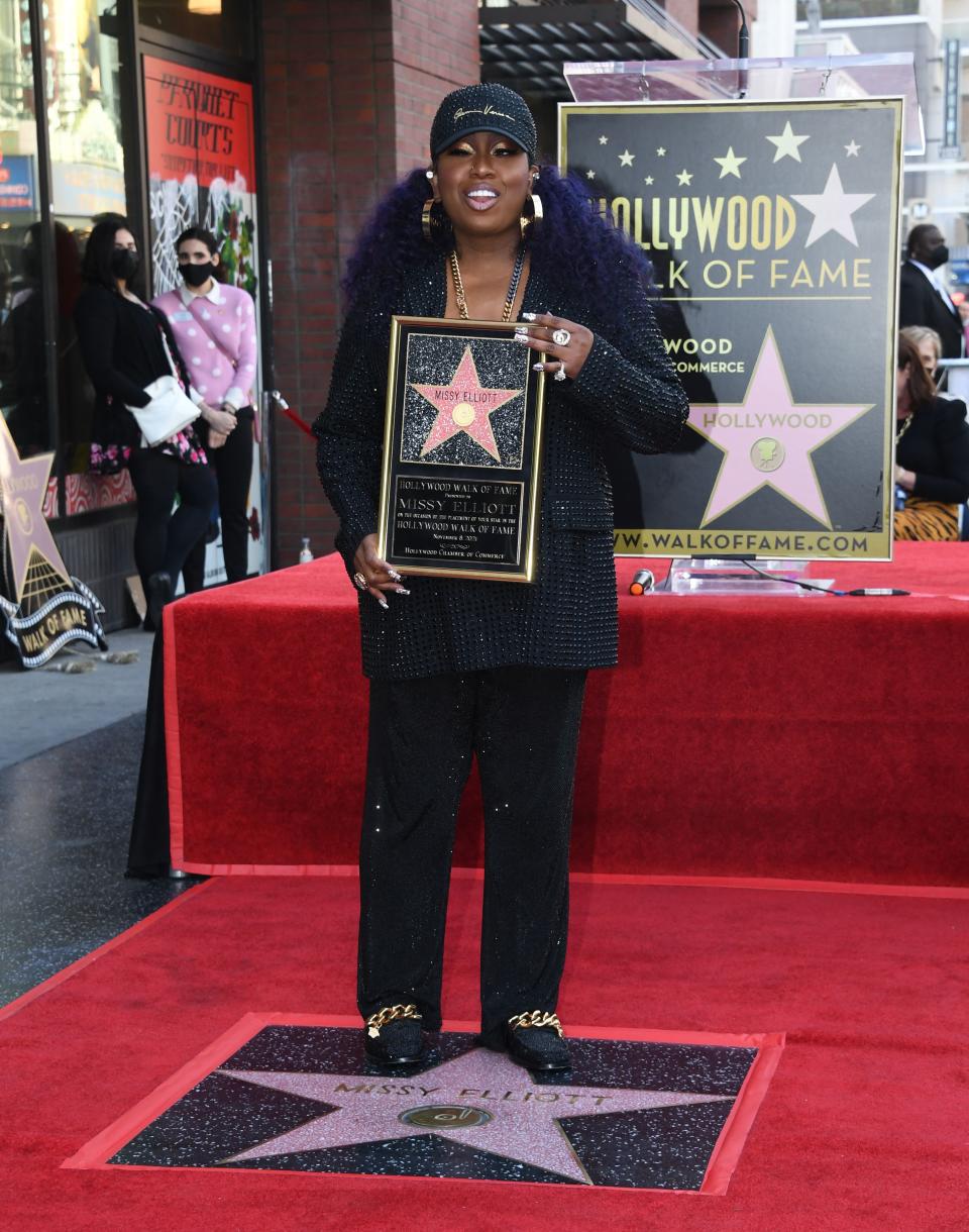 Missy Elliott poses as she is honored with the 2,708th star on the Hollywood Walk of Fame on Nov. 8, 2021. (Photo: Robyn Beck / AFP via Getty Images)